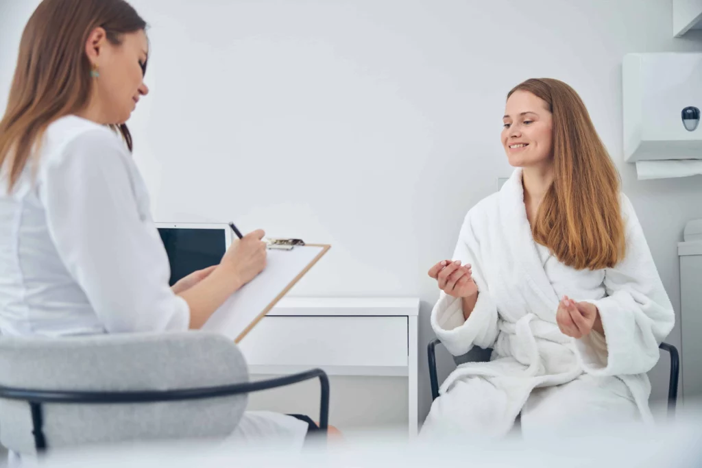 Consultation scene with a provider and patient | Luna Med Spa in Brookfield, WI