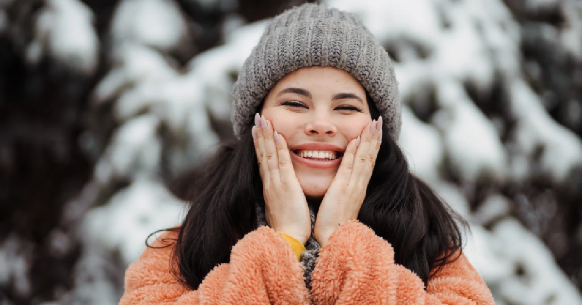 Woman With Healthy Skin During Winter Highlighting Seasonal Skin Care in Wisconsin by Luna Med Spa in Brookfield, WI