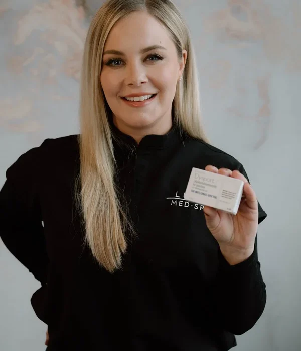 Close-up of a woman holding a box of Dysport injectable treatment in Brookfield, WI | Luna Med Spa